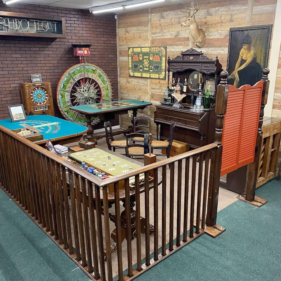 Gaming tables and casino memorabilia display inside the History of Hot Springs Gambling Museum